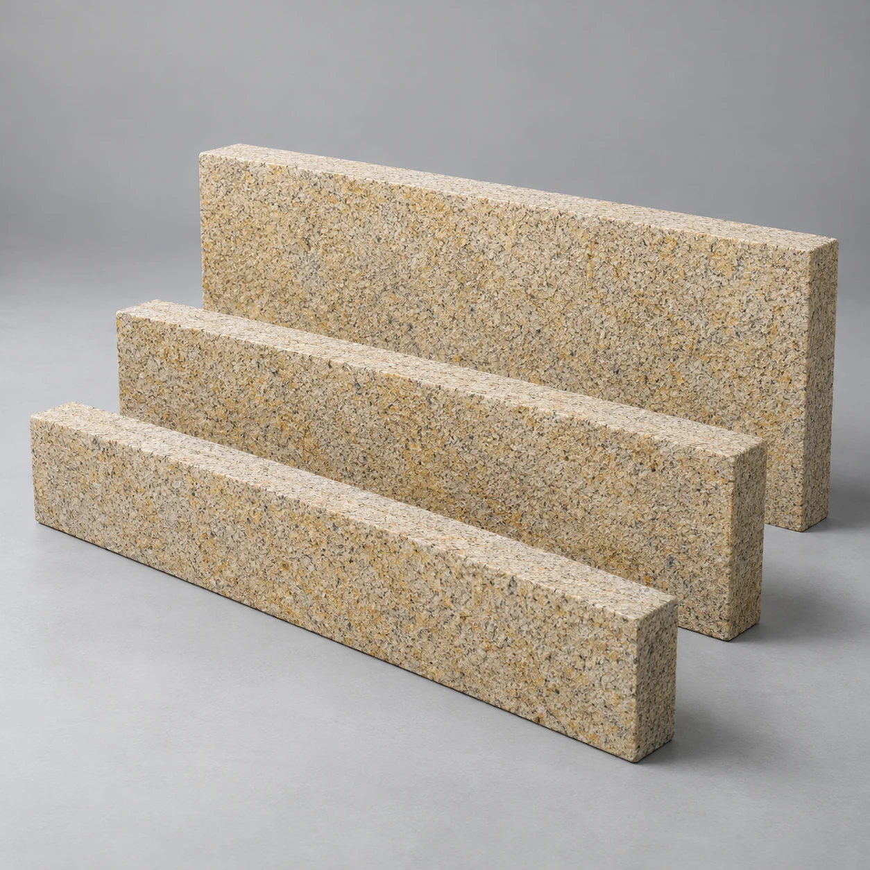 Granit Bordstein gelb gestockt 